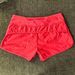 Lululemon their size chart 4 Orange Pink shorts